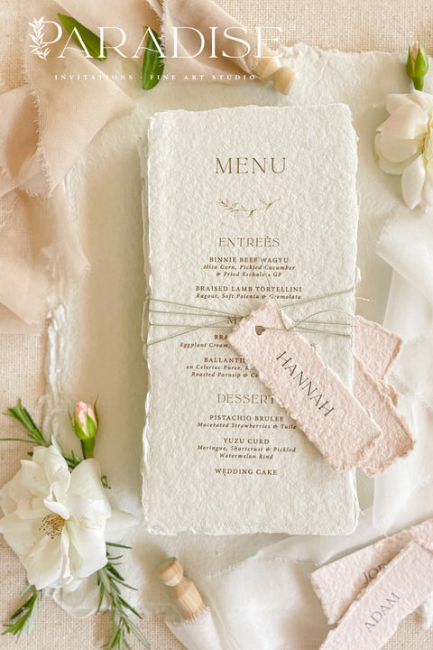 Add timeless charm and fine art elegance to your table styling with our handmade paper wedding menus, beautifully crafted from 100% cotton rag paper with naturally torn deckled edges. Each menu is adorned with a delicate name tag tied with fine thread, offering both practicality and sophistication as a combined menu and place card. The refined typography, minimal layout, and soft color palette bring a romantic yet modern touch, making these menus the perfect complement to luxury weddings, rehearsal dinners.