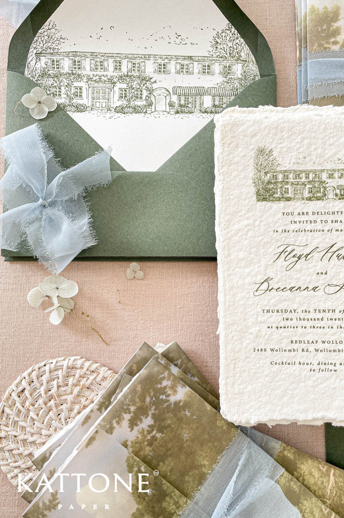 Sage green envelope liners featuring custom venue sketch artwork designed to coordinate beautifully with the invitation suite for a cohesive luxury stationery look.