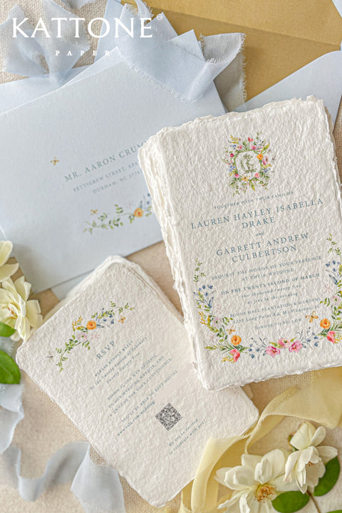 Craft your dream wedding with our exquisite Handmade Paper Wedding Invitations featuring elegant deckled edges. Each invite is beautifully designed and paired with luxurious silk ribbon, offering a touch of sophistication to your special day. Perfect for setting the tone of your celebration, these invitations will delight your guests and reflect your unique style. Customizable options are available to make each piece truly yours. Elevate your wedding stationery with our stunning creations today!