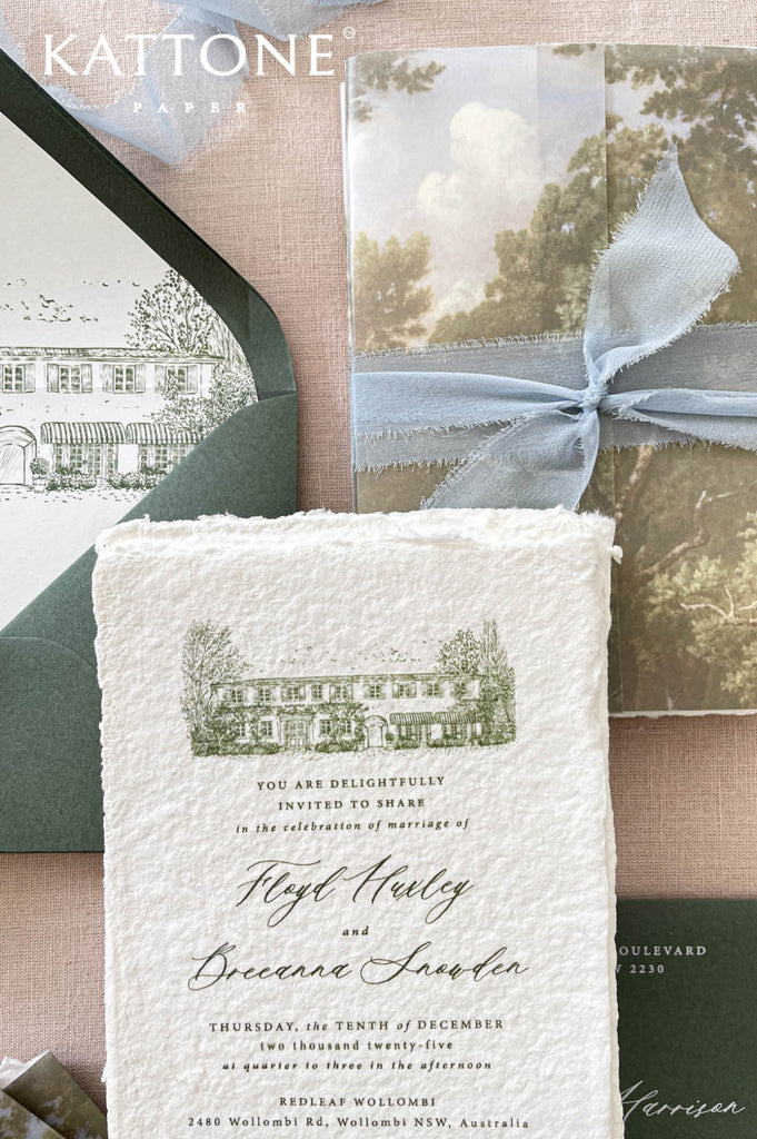 Luxury wedding stationery featuring a personalized venue illustration printed on handmade cotton paper, showcasing architectural details with soft green tones and fine line artwork.