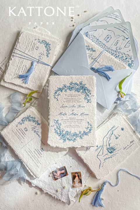 Embrace bohemian charm and natural elegance with the Juliette boho rustic stationery sets. Each handmade wedding invitation is a beautiful work of art, featuring luxurious cotton rag paper with a romantic deckle edge. To complete the bohemian feel, every suite is embellished with a delicate tassel, creating a uniquely personal and tactile experience for your guests. The combination of rustic textures and charming details makes this collection perfect for a relaxed and romantic celebration.