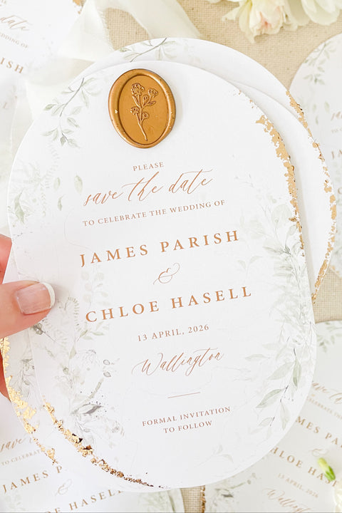 Make a lasting first impression with our Double Arch Save the Date cards, a modern yet timeless design crafted for couples who value artistry and refinement. Printed on luxury textured cardstock with subtle botanical detailing, these cards feature a unique arched silhouette, shimmering gold foil lettering, and a hand-stamped wax seal - the perfect harmony of elegance and contemporary design.