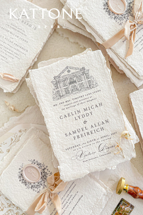 Invite your guests to your special day with the artful and personal charm of these custom wedding invitations. The unique suite features a beautiful, custom venue illustration sketch, hand-drawn by us to capture the essence of your wedding location. Designed with a light summer breeze theme and a boho chic aesthetic, this wedding stationery sets a warm, relaxed, and intimate tone for your upcoming celebration.
