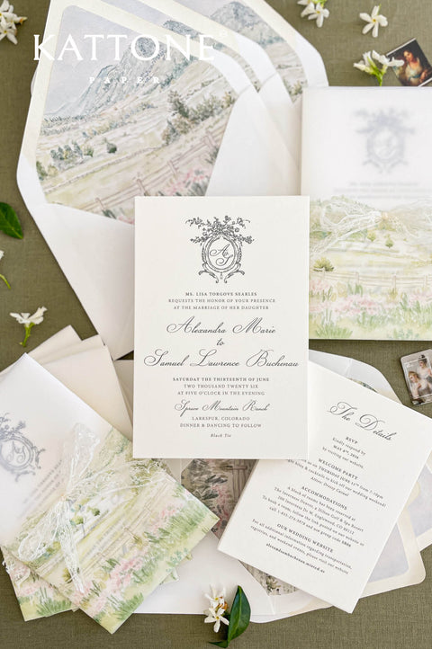 Luxury wedding invitation with vellum wrap featuring custom watercolor landscape printed on smooth cardstock.