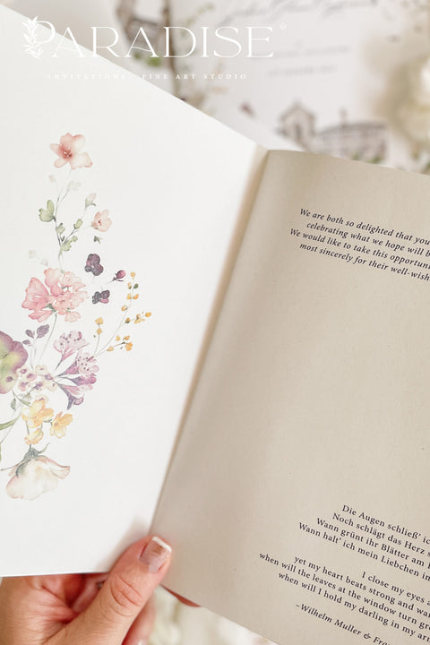 This handmade wedding program showcases your venue in a soft watercolor illustration, transforming a functional piece into a meaningful keepsake. Printed on premium fine-art paper with elegant typography, the design blends artistry and sentiment, giving your ceremony a romantic, personalized touch. Perfect for classic, garden, estate, and fine-art weddings, it elevates your details with charm, personality, and timeless style.