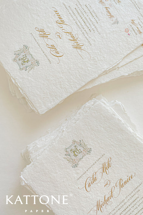 This exquisite trifold wedding invitation set offers a blend of modern design and personalized artistry. Each handmade paper invitation features a beautifully hand-painted custom watercolor monogram of your initials, creating a unique and personal touch. The convenient trifold design offers ample space for all your wedding details, all wrapped in a beautifully elegant package that your guests will adore.