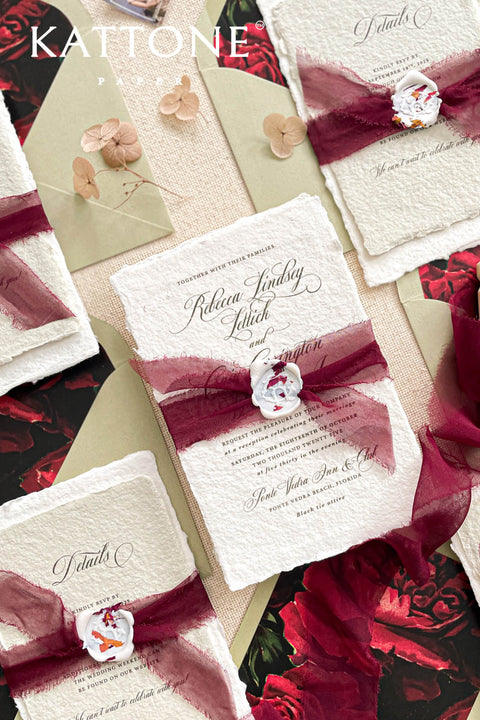 Announce your special day with the artistic charm and bohemian elegance of this deckle edge cotton rag suite. The luxurious, handmade paper adds a rich, organic texture, while the elegant calligraphy wedding stationery set provides a touch of chic sophistication. This boho chic invite is a perfect blend of modern elegance and laid-back romance, setting a warm and inviting tone for your celebration.