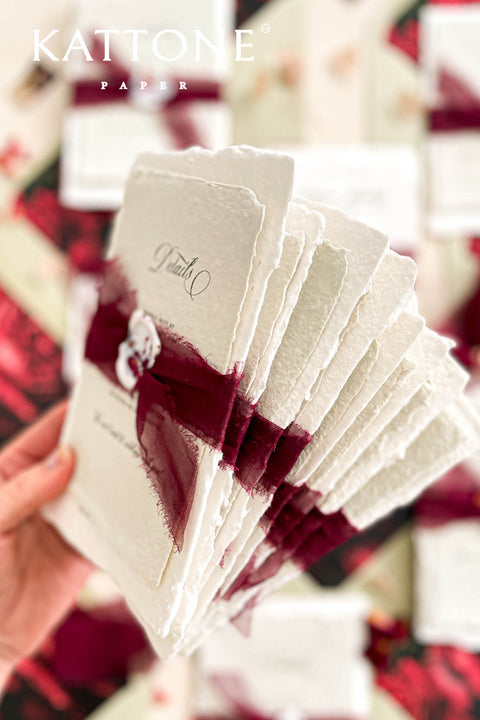 Announce your special day with the artistic charm and bohemian elegance of this deckle edge cotton rag suite. The luxurious, handmade paper adds a rich, organic texture, while the elegant calligraphy wedding stationery set provides a touch of chic sophistication. This boho chic invite is a perfect blend of modern elegance and laid-back romance, setting a warm and inviting tone for your celebration.