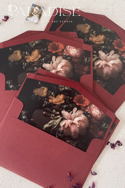 Burgundy wedding envelopes with printed guest addresses, crafted from premium paper and styled to showcase rich color, clean typography, and refined stationery quality.