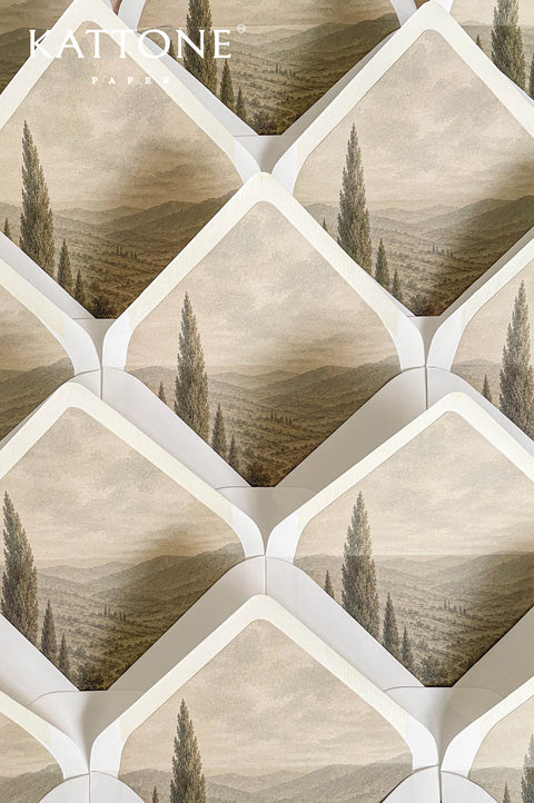 Premium wedding envelopes with custom landscape liners designed for destination weddings, vineyard celebrations, and luxury stationery suites.
