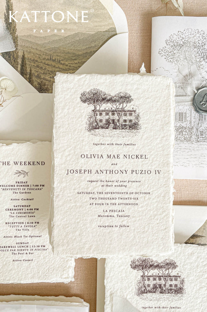 Elegant handmade cotton paper wedding invitation with deckled edges featuring a custom architectural sketch of a Tuscan villa venue paired with refined serif typography.