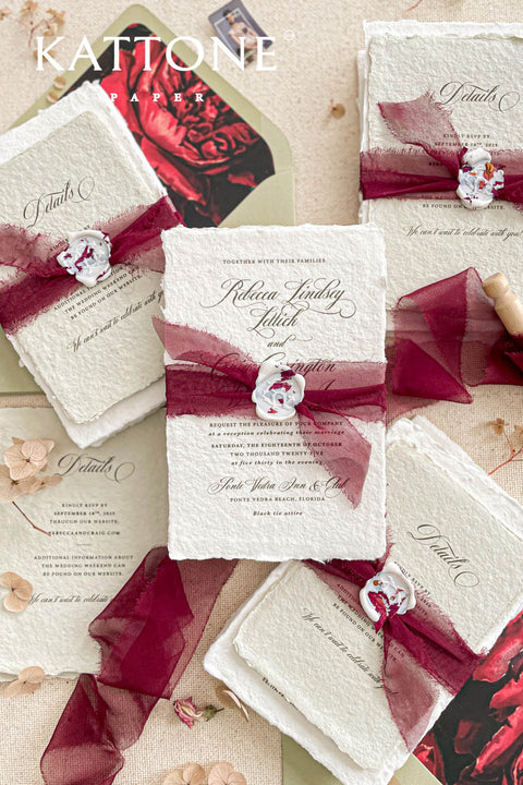 Announce your special day with the artistic charm and bohemian elegance of this deckle edge cotton rag suite. The luxurious, handmade paper adds a rich, organic texture, while the elegant calligraphy wedding stationery set provides a touch of chic sophistication. This boho chic invite is a perfect blend of modern elegance and laid-back romance, setting a warm and inviting tone for your celebration.