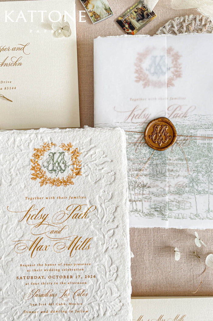 Luxury wedding invitation featuring blind embossed floral artwork pressed into handmade cotton paper, creating rich texture, depth, and an elevated tactile finish.