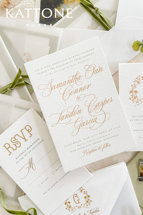 Elegant, timeless, and infused with personal charm - this wedding invitation suite was designed to announce your celebration with sophistication and warmth. Printed on luxury cotton paper. The suite features a beautifully hand-drawn monogram, symbolizing the union of two names in an artful botanical wreath. A romantic script font paired with refined serif text brings balance and grace, while vellum jackets and olive ribbons add layers of soft, organic beauty.