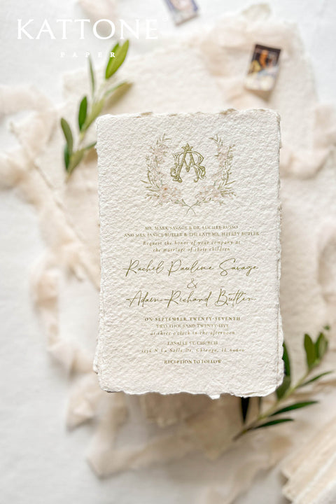 This handmade paper wedding invitation suite captures the essence of natural romance and bespoke craftsmanship. Printed on luxury cotton paper with beautifully deckled edges, each invitation is a tactile work of art that feels timeless and refined. The suite features a custom hand-drawn map, turning your wedding location into a cherished keepsake that guides guests with personal artistry.