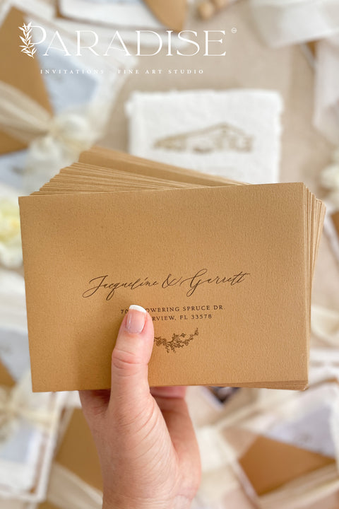 Fine art wedding stationery featuring envelopes with watercolor envelope liners and romantic floral styling.