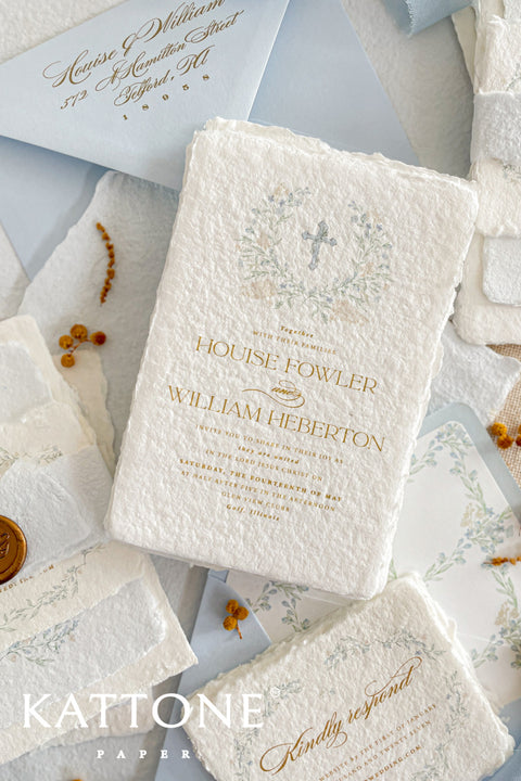 A serene and faith-inspired christening invitation crafted from luxurious handmade paper and adorned with soft watercolor botanicals. Featuring a delicate floral wreath and subtle Christian cross, this design blends timeless elegance with gentle color and refined typography. Perfect for baptisms and church ceremonies, it offers a meaningful keepsake that beautifully honors this sacred milestone.