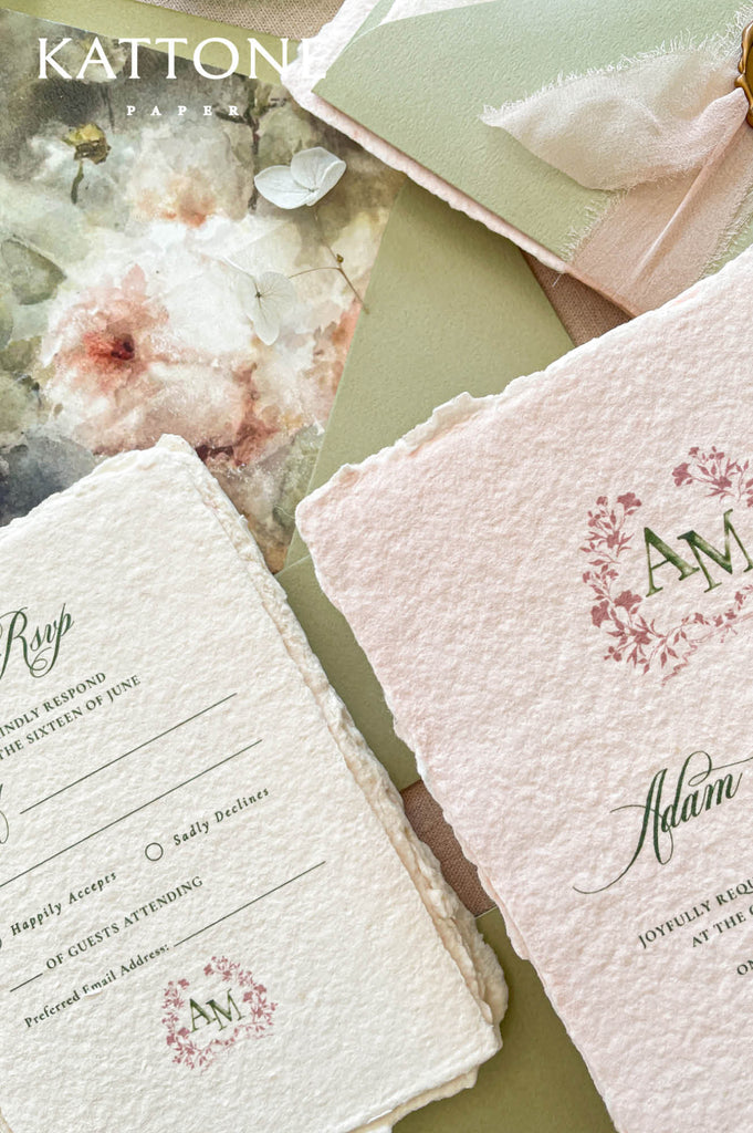 Luxury wedding stationery featuring soft blush pink handmade cotton paper with organic deckled edges for a romantic elevated aesthetic.