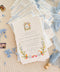 This exquisite wedding invitation set offers a blend of timeless charm and personal artistry. Perfect for a summer wedding, each suite features a custom, hand-painted watercolor monogram with a delicate floral design. Printed on luxurious handmade paper, these floral invites offer a rich, tactile experience and a unique, romantic preview of your special day.