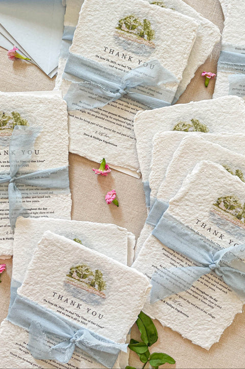Handmade paper thank you cards with custom watercolor wedding venue and silk ribbon, fine art wedding stationery.