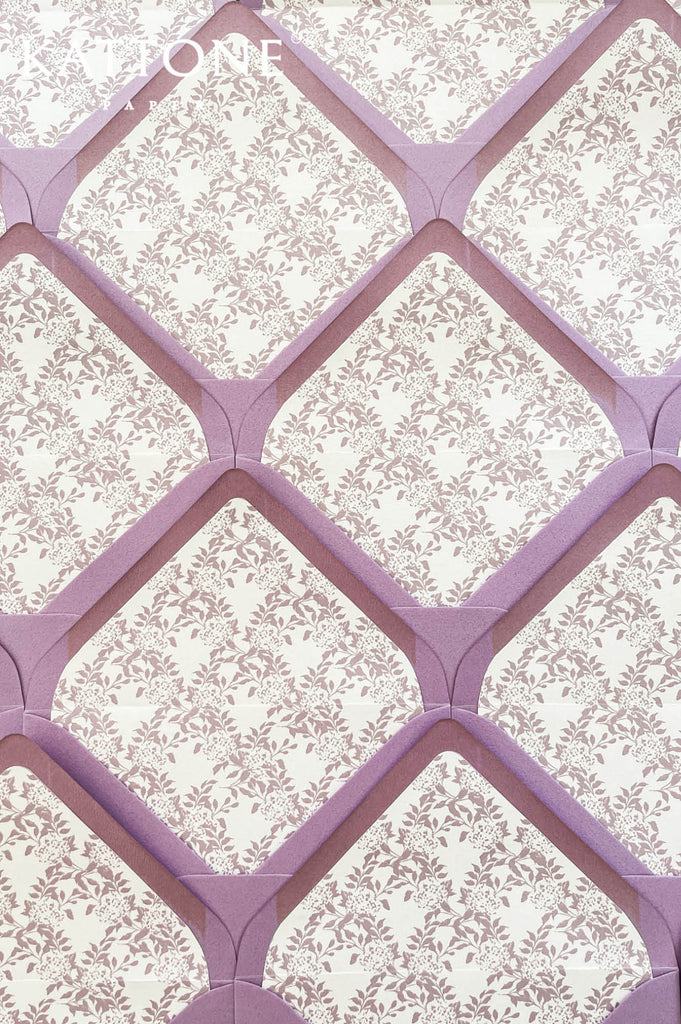 Lavender wedding envelopes featuring intricate botanical patterned liners in soft floral design.