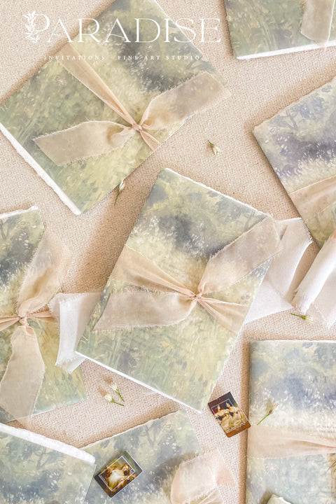 Announce your special day with timeless elegance through these handmade watercolor wreath wedding invitations — a perfect blend of artistry, romance, and personal touch. Each invitation features a delicately painted floral wreath, evoking natural beauty and heartfelt simplicity. Designed and assembled by hand, they set the tone for a wedding that’s both intimate and unforgettable.