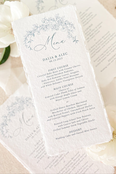 Add a touch of fine-art elegance to your event with our handmade paper wedding menus, featuring delicate blue floral illustrations and soft deckled edges. Each menu is printed on luxury cotton handmade paper, offering a naturally textured surface and an artisan feel that elevates any tablescape. Perfect for romantic weddings, garden celebrations, or intimate dinner parties, these menus combine artistry and craftsmanship - creating a refined keepsake your guests will adore.