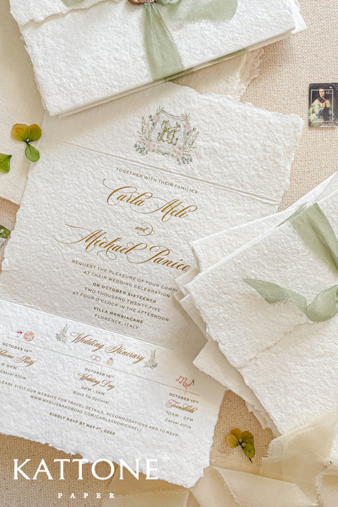 This exquisite trifold wedding invitation set offers a blend of modern design and personalized artistry. Each handmade paper invitation features a beautifully hand-painted custom watercolor monogram of your initials, creating a unique and personal touch. The convenient trifold design offers ample space for all your wedding details, all wrapped in a beautifully elegant package that your guests will adore.