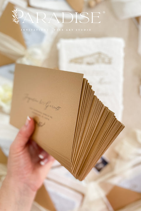 Fine art wedding stationery featuring envelopes with watercolor envelope liners and romantic floral styling.