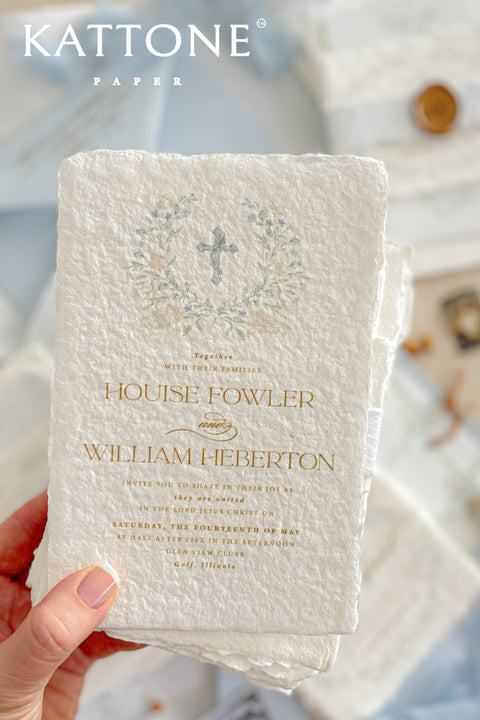 A serene and faith-inspired christening invitation crafted from luxurious handmade paper and adorned with soft watercolor botanicals. Featuring a delicate floral wreath and subtle Christian cross, this design blends timeless elegance with gentle color and refined typography. Perfect for baptisms and church ceremonies, it offers a meaningful keepsake that beautifully honors this sacred milestone.