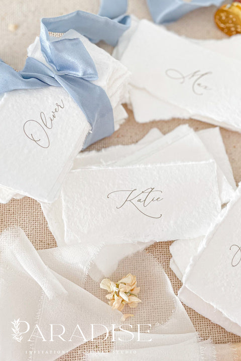 Create a soft, elegant tablescape with our handmade paper place cards, crafted from premium cotton rag paper and finished with naturally torn deckled edges. Each card showcases refined calligraphy and a romantic, fine-art aesthetic - perfect for weddings, rehearsal dinners, intimate parties, and luxury celebrations. Designed to elevate your guest seating display, these artisan-crafted cards bring texture, charm, and timeless beauty to any event.