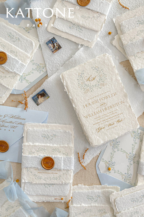 Embrace bohemian charm and natural elegance with the Alcina boho rustic stationery sets. Each handmade wedding invitation is a beautiful work of art, featuring luxurious cotton rag paper with a romantic deckle edge. To complete the bohemian feel, every suite is embellished with a delicate tassel, creating a uniquely personal and tactile experience for your guests. The combination of rustic textures and charming details makes this collection perfect for a relaxed and romantic celebration.