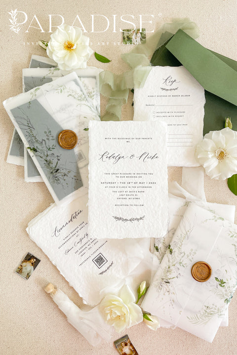 This exquisite wedding invitations suite offers a blend of natural elegance and modern sophistication. Perfect for a garden summer wedding, these beautiful invites feature a timeless modern calligraphy design printed on premium sustainable stationery. The result is a truly elegant and thoughtful suite that beautifully captures the essence of your special day while being environmentally conscious.
