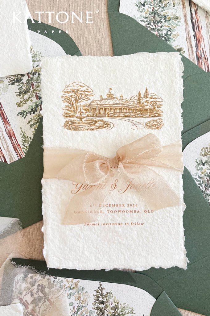 Save the date stationery suite with sage green envelopes, botanical liners and textured handmade paper cards.