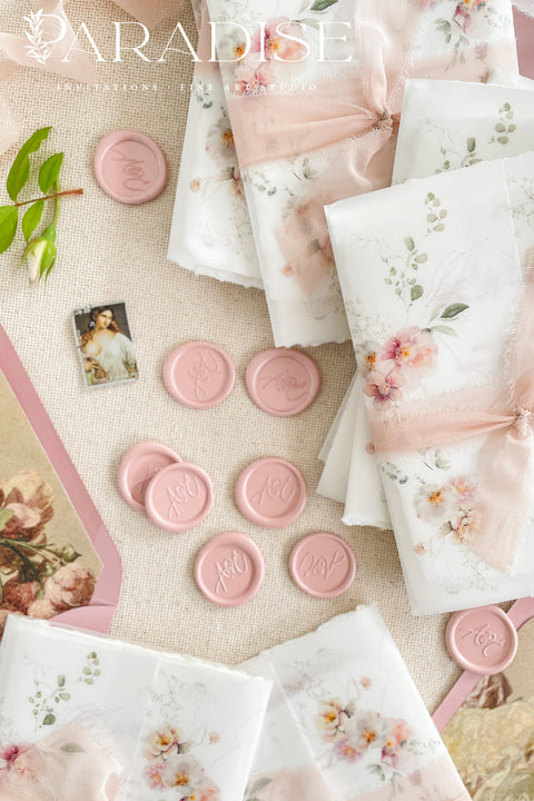 Add a romantic finishing touch to your stationery with these handcrafted blush wax seals, designed to complement fine art invitations and delicate floral designs. Each seal is individually poured in a soft pink hue and stamped with a timeless monogram, creating an elegant accent that feels both modern and heirloom-inspired. Perfect for wedding invitations, envelopes, and special keepsakes, these wax seals bring texture, warmth, and refined detail to every piece.