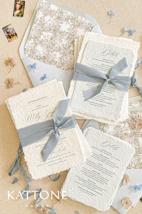 This exquisite handmade cotton paper wedding invitations suite offers a blend of natural elegance and personalized artistry. Each invite is a work of fine art, with a beautiful custom calligraphy design created just for you. The luxurious, textured paper and romantic typography create a truly memorable and heartfelt stationery set that will be cherished by your guests long after your special day.