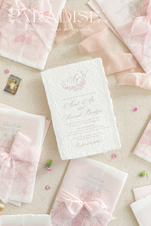 Announce your special day with the effortless, romantic charm of these handmade paper wedding invitations. Crafted for a boho wedding, this suite captures the free-spirited beauty of the season. Each invite is printed on soft and luxurious cotton paper, providing a unique, tactile experience for your guests. The light, airy design and premium paper are the perfect combination for a memorable summer wedding.