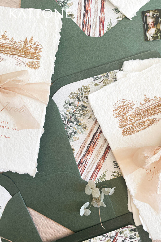 Close up of deckled edge cotton paper showing natural fibers and artisan texture.