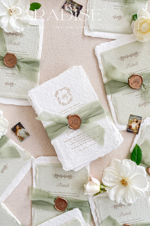 This exquisite wedding invitations suite offers a blend of natural elegance and modern romance. Perfect for a green summer wedding, these invitations are printed on luxurious handmade paper, which provides a rich, tactile feel. The elegant modern calligraphy design adds a touch of contemporary sophistication, setting a fresh and heartfelt tone for your special day.