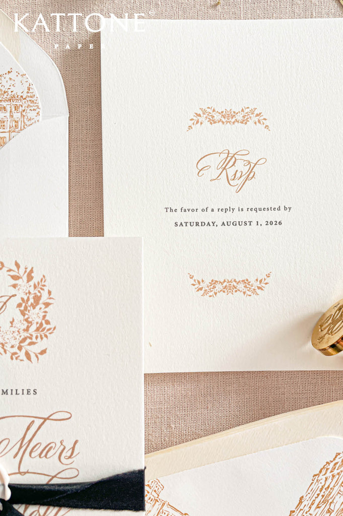 Soft black velvet ribbon tied around luxury wedding invitations adds rich contrast, texture, and elevated styling.