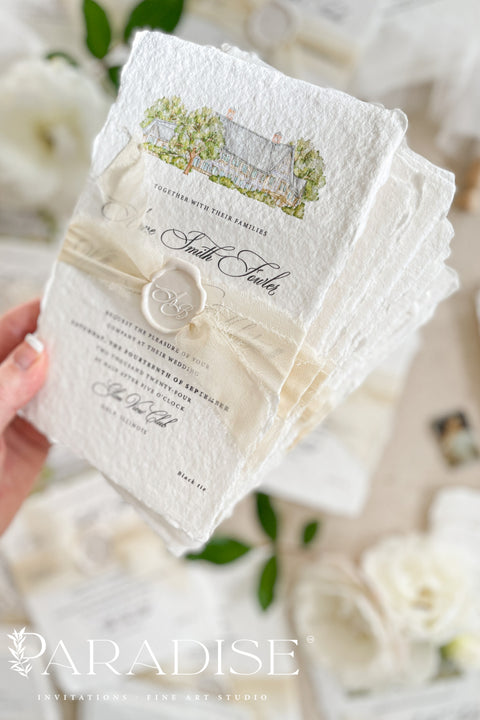 This exquisite wedding invitations suite offers a blend of fine artistry and personal romance. Each fine art invite is printed on luxurious handmade paper, providing a rich, tactile feel. The centerpiece is a custom, hand-painted watercolor venue illustration that captures the unique charm of your location, creating a truly memorable keepsake for your guests. This romantic suite is a beautiful preview of your special day.