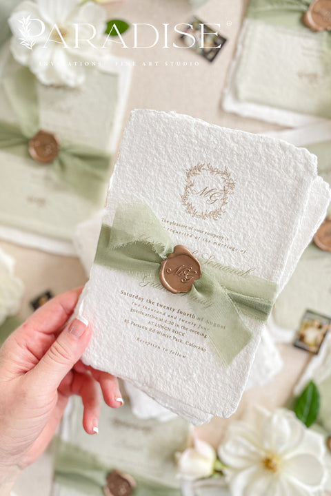 This exquisite wedding invitations suite offers a blend of natural elegance and modern romance. Perfect for a green summer wedding, these invitations are printed on luxurious handmade paper, which provides a rich, tactile feel. The elegant modern calligraphy design adds a touch of contemporary sophistication, setting a fresh and heartfelt tone for your special day.