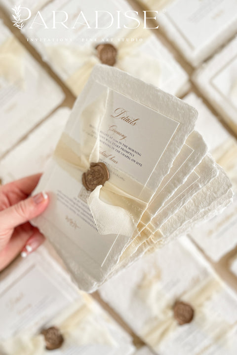 This exquisite wedding invitations suite offers a blend of natural elegance and personalized artistry. Perfect for an ivory classy wedding, each invite features a bespoke floral custom monogram, created just for you. As an eco friendly wedding invites choice, this stationery is both beautiful and sustainable, making it a thoughtful and sophisticated way to set the tone for your special day.