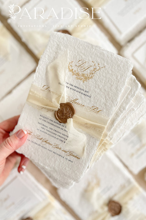 This exquisite wedding invitations suite offers a blend of natural elegance and personalized artistry. Perfect for an ivory classy wedding, each invite features a bespoke floral custom monogram, created just for you. As an eco friendly wedding invites choice, this stationery is both beautiful and sustainable, making it a thoughtful and sophisticated way to set the tone for your special day.