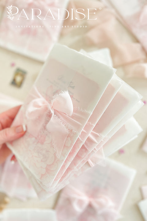 Announce your special day with the effortless, romantic charm of these handmade paper wedding invitations. Crafted for a boho wedding, this suite captures the free-spirited beauty of the season. Each invite is printed on soft and luxurious cotton paper, providing a unique, tactile experience for your guests. The light, airy design and premium paper are the perfect combination for a memorable summer wedding.