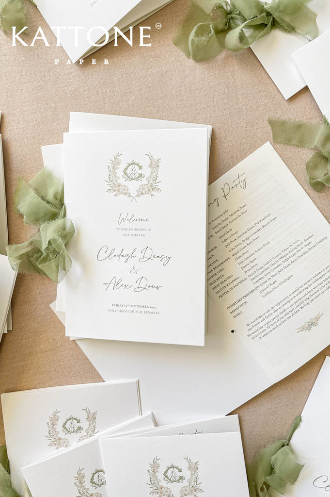 Botanical wedding program printed on luxury cardstock with sage silk ribbon.