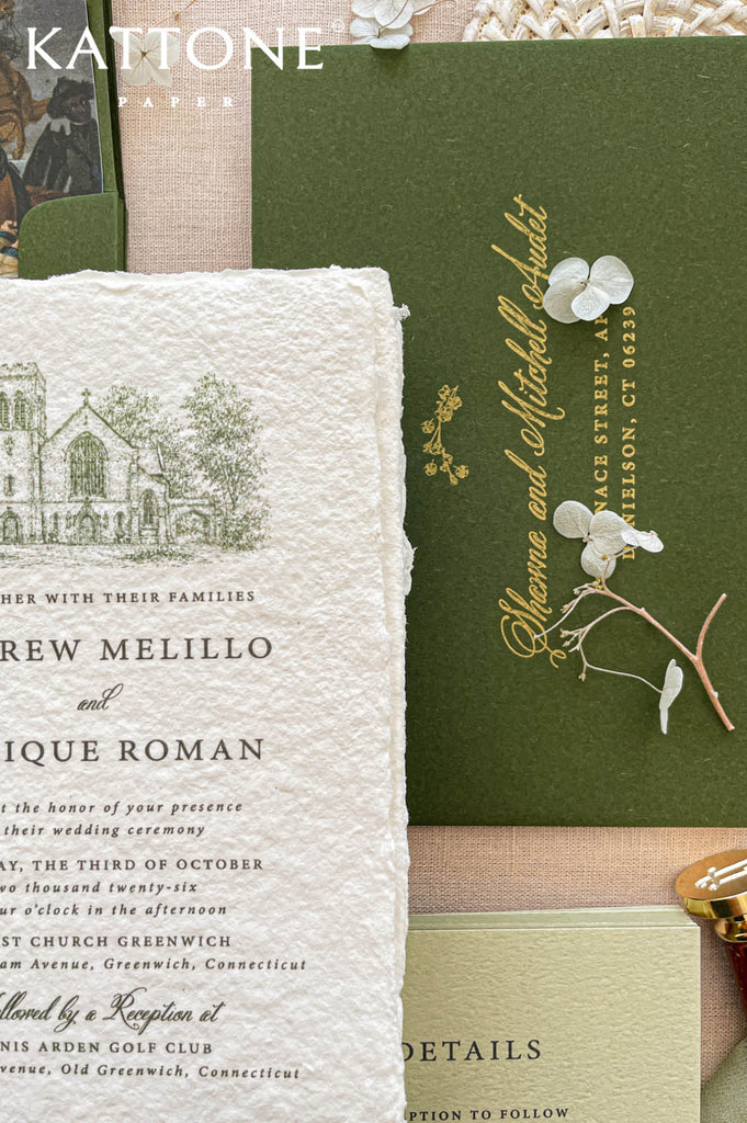 Handmade cotton paper wedding invitations with deckled edges paired with vellum covers and deep olive green envelopes.