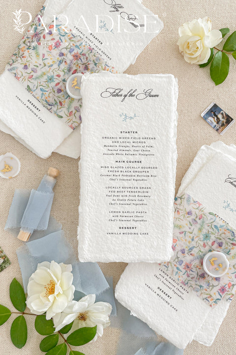 Add a touch of botanical beauty and fine art elegance to your event with our handmade paper wedding menus, crafted from 100% cotton rag paper with delicately torn deckled edges. Each menu features a vibrant floral vellum wrap paired with a soft silk ribbon and wax seal, creating an exquisite balance between organic texture and romantic detail. The minimalist typography allows the floral design to shine, making these menus perfect for garden weddings, spring celebrations and outdoor receptions.