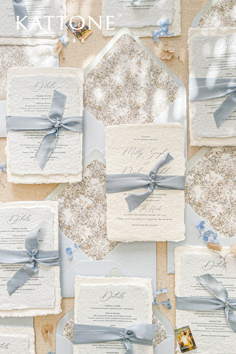 This exquisite handmade cotton paper wedding invitations suite offers a blend of natural elegance and personalized artistry. Each invite is a work of fine art, with a beautiful custom calligraphy design created just for you. The luxurious, textured paper and romantic typography create a truly memorable and heartfelt stationery set that will be cherished by your guests long after your special day.
