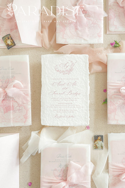 Announce your special day with the effortless, romantic charm of these handmade paper wedding invitations. Crafted for a boho wedding, this suite captures the free-spirited beauty of the season. Each invite is printed on soft and luxurious cotton paper, providing a unique, tactile experience for your guests. The light, airy design and premium paper are the perfect combination for a memorable summer wedding.